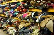 Aisle between leather shelves at METAFORA wholesale