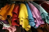 Aisle between leather shelves at METAFORA wholesale