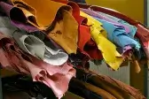 Yellow and green leathers displayed at METAFORA wholesale